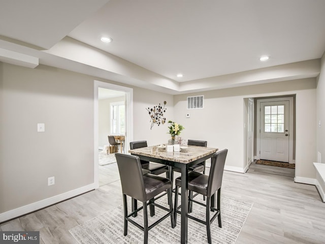 dining room with light hardwood / wood-style flooring