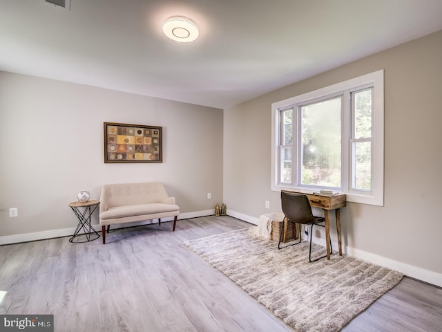 living area featuring light hardwood / wood-style flooring