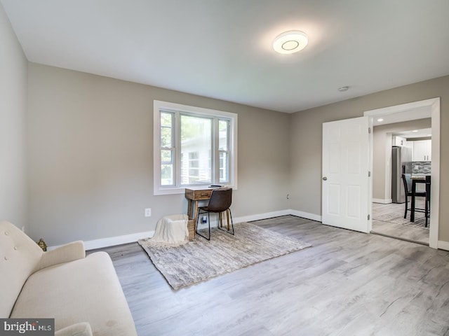 living area with wood-type flooring