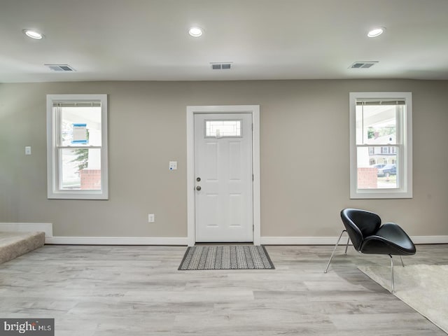 foyer entrance featuring light hardwood / wood-style flooring