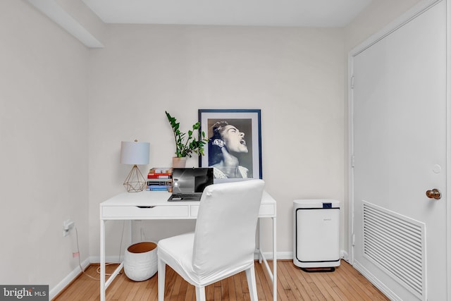 office space featuring light hardwood / wood-style floors