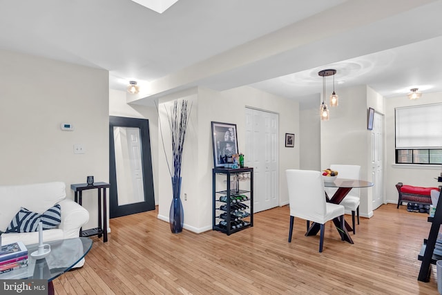 dining room featuring light wood-type flooring