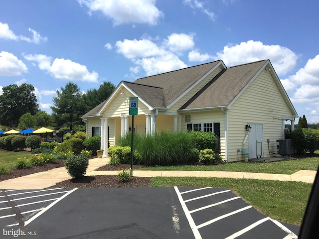 view of front of property with cooling unit