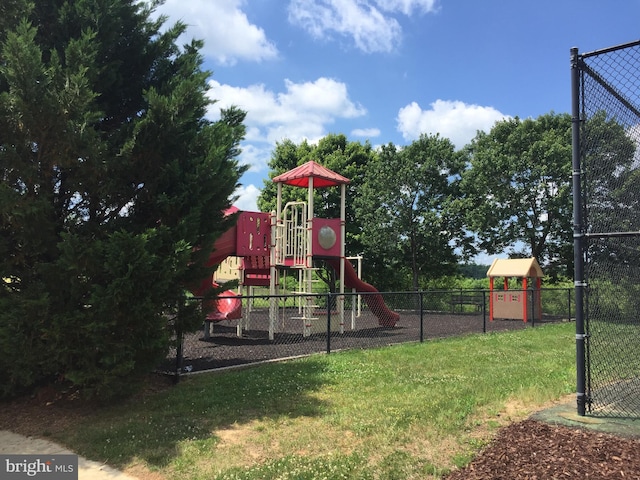 view of jungle gym featuring a yard