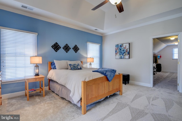 bedroom featuring visible vents, baseboards, lofted ceiling, and carpet flooring