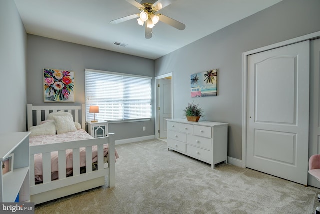 bedroom with visible vents, baseboards, ceiling fan, and carpet flooring