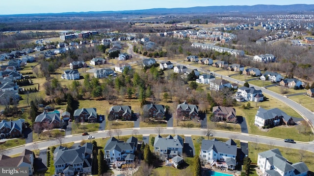 bird's eye view with a mountain view and a residential view