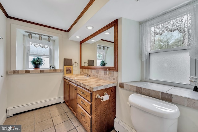 bathroom featuring a baseboard radiator, tile patterned flooring, crown molding, toilet, and vanity