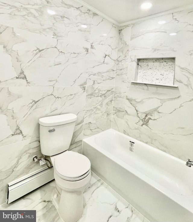 bathroom featuring toilet, tile walls, crown molding, and a baseboard heating unit