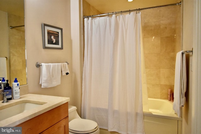 full bathroom with toilet, vanity, and shower / tub combo