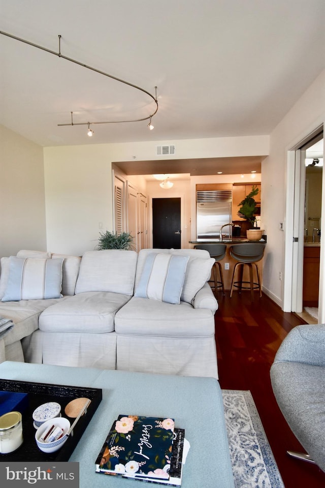 living room featuring dark hardwood / wood-style floors