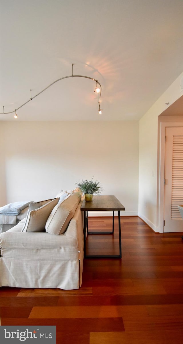 living room featuring dark hardwood / wood-style flooring