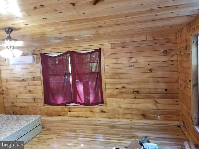 interior space featuring a wall mounted AC, wooden walls, and wood ceiling