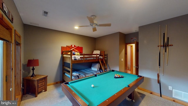 recreation room featuring light colored carpet, ceiling fan, and pool table