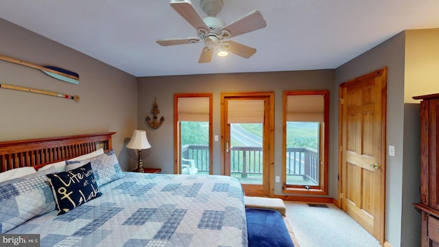 carpeted bedroom with access to outside and ceiling fan