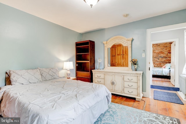 bedroom featuring light hardwood / wood-style flooring