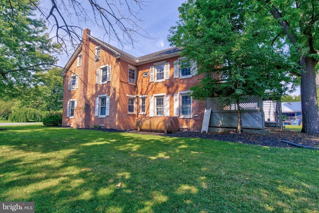 exterior space with a lawn