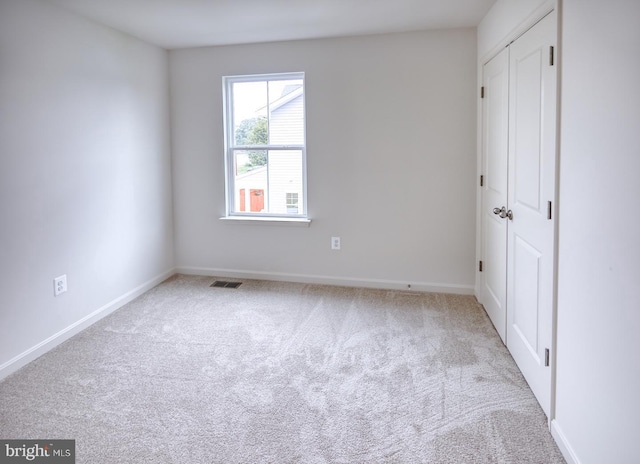 view of carpeted empty room