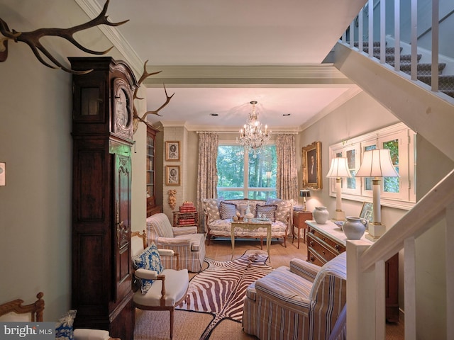 living room with an inviting chandelier and ornamental molding