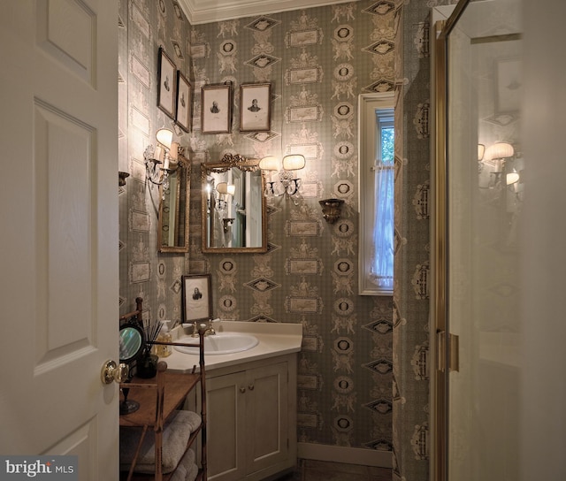 bathroom featuring vanity and ornamental molding