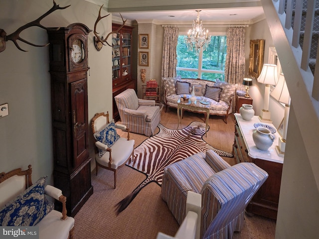 living room featuring crown molding and a notable chandelier