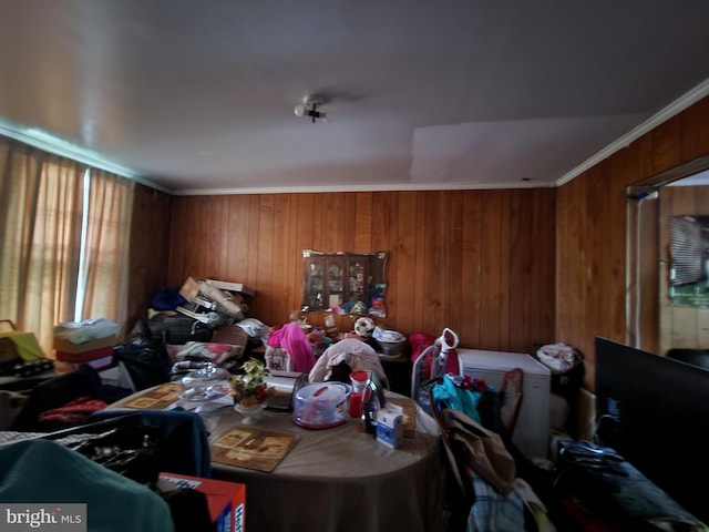 misc room with wood walls and crown molding