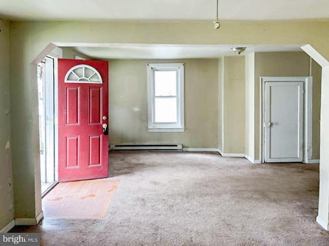 entrance foyer featuring carpet flooring and a baseboard radiator