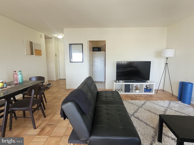 living room with light parquet flooring