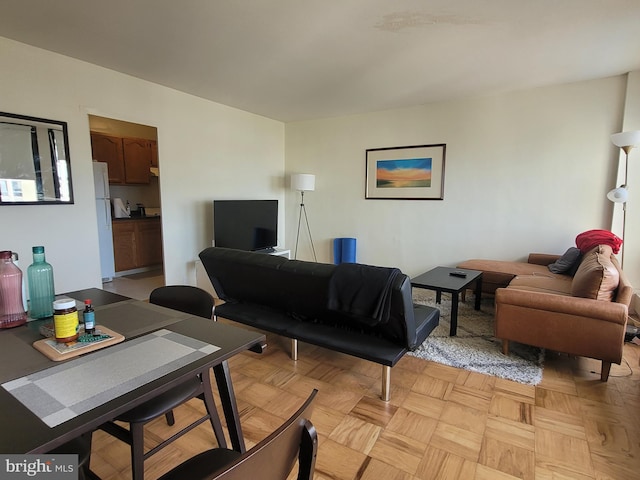 living room featuring light parquet floors