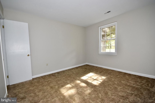 unfurnished room with carpet