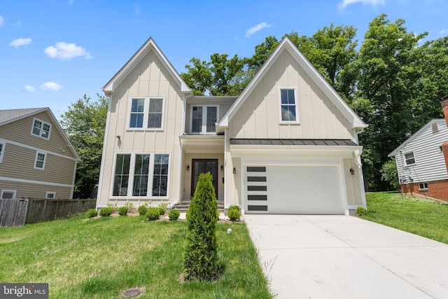 view of front facade featuring a front yard and a garage