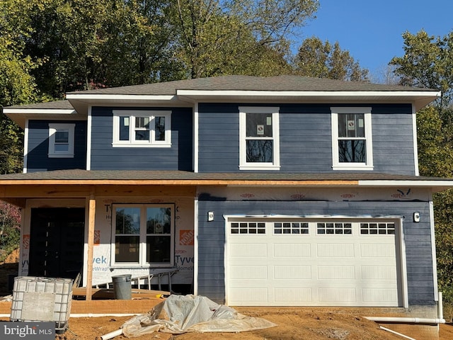 view of front of house with a garage