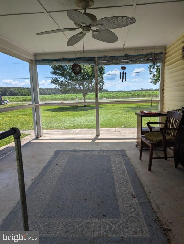 view of patio / terrace featuring ceiling fan