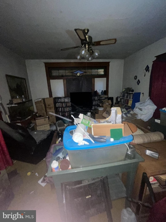 living room with ceiling fan