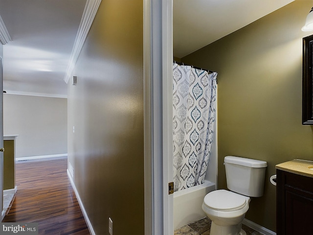 full bathroom with shower / bath combo, ornamental molding, toilet, vanity, and hardwood / wood-style flooring