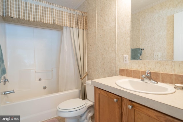 full bathroom with shower / tub combo, vanity, toilet, and ornamental molding