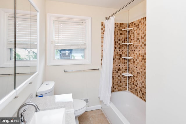 full bathroom featuring shower / bath combination with curtain, tile patterned floors, toilet, and vanity