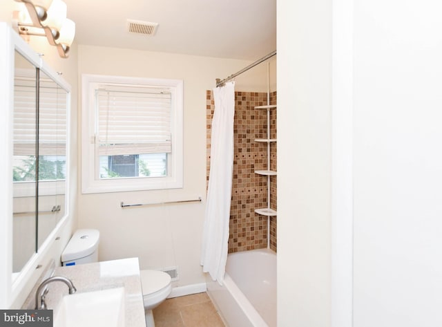 full bathroom with tile patterned flooring, vanity, shower / tub combo with curtain, and toilet