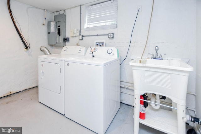 laundry area featuring washer and dryer and electric panel