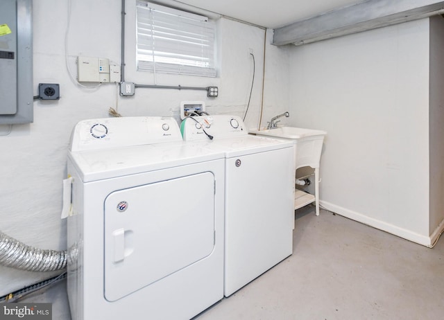 washroom with electric panel and independent washer and dryer