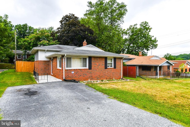 view of front of house with a front lawn