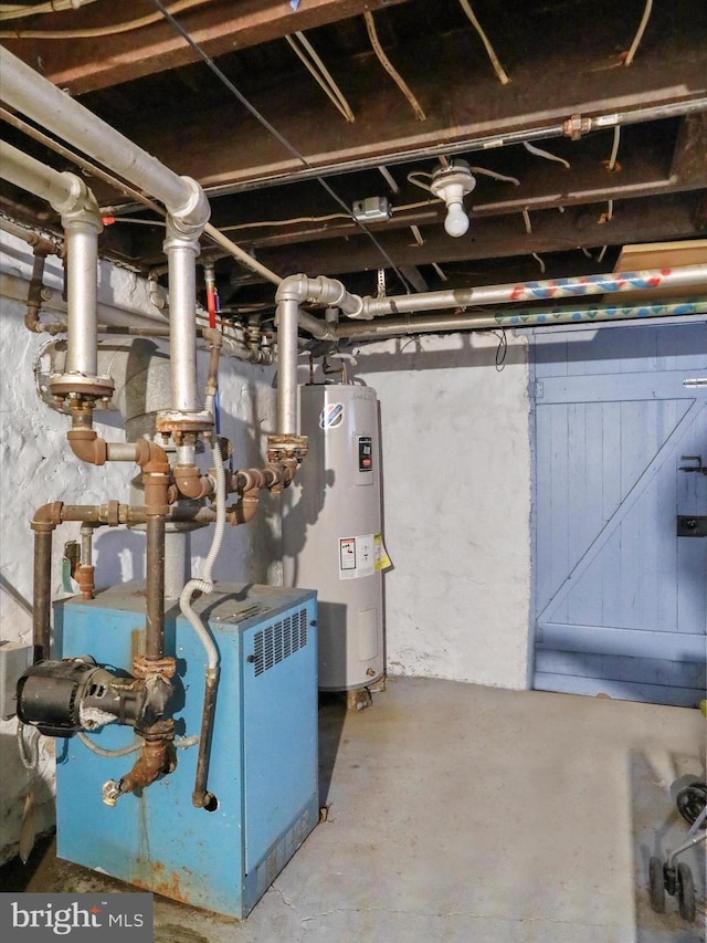 utility room with electric water heater