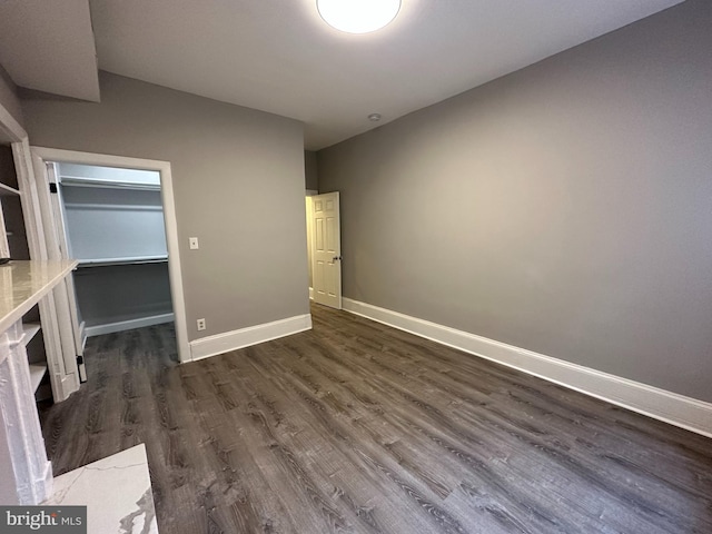 interior space with dark wood-type flooring