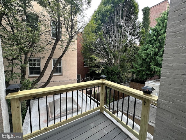 wooden terrace featuring area for grilling