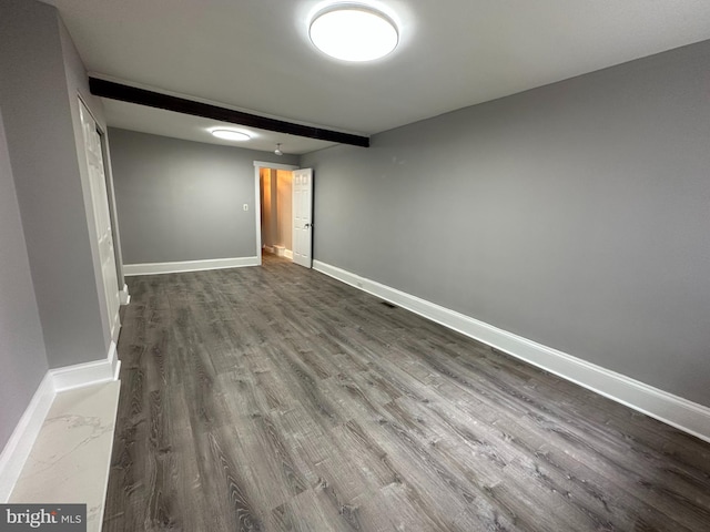 empty room featuring hardwood / wood-style flooring