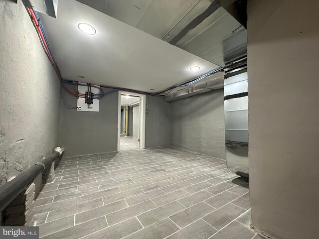 basement featuring light hardwood / wood-style floors