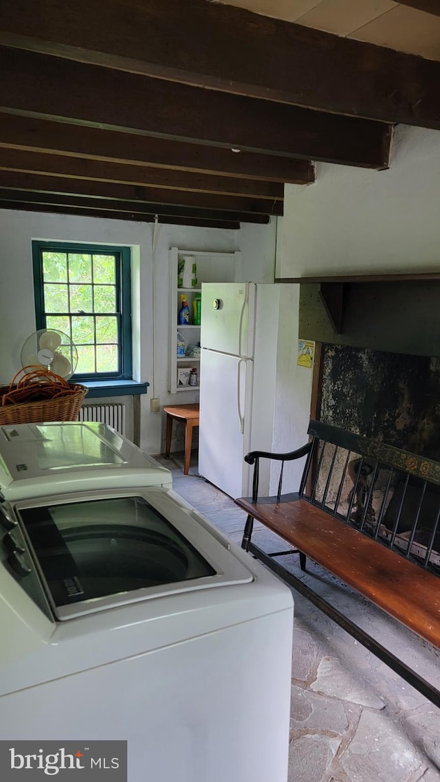 laundry room with washer / dryer