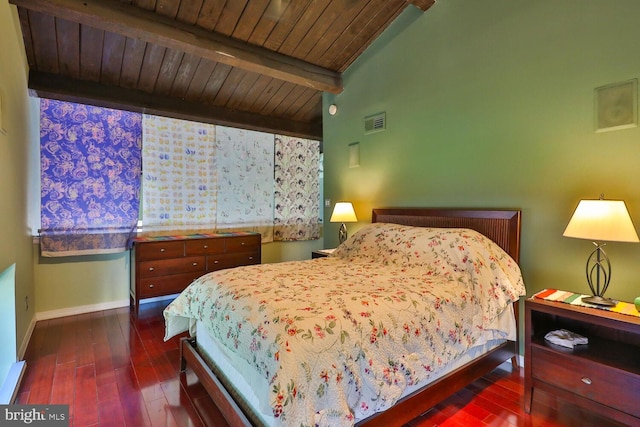 bedroom with dark hardwood / wood-style floors, lofted ceiling with beams, and wood ceiling