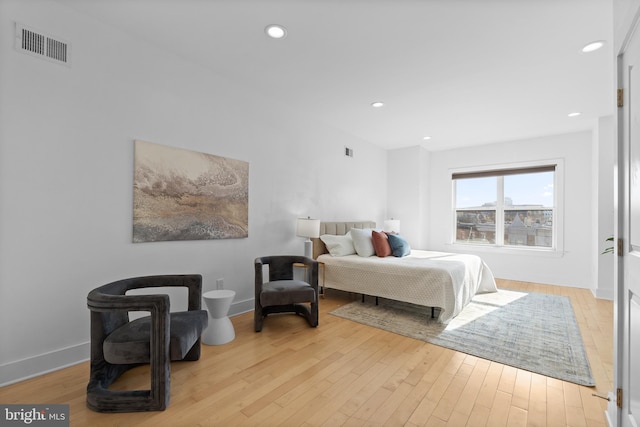 bedroom featuring light wood-type flooring