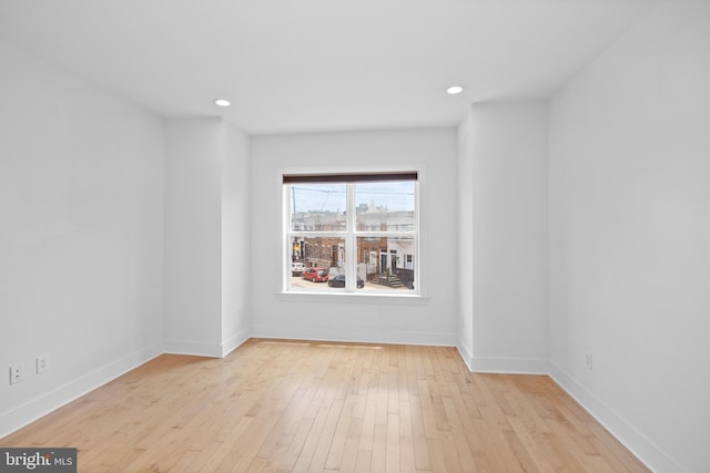 empty room with light wood-type flooring